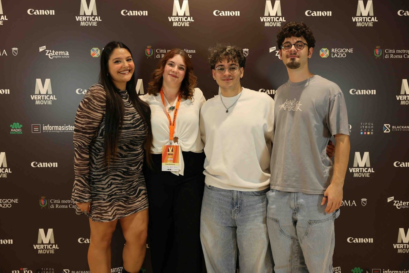 Quattro membri della troupe di Dynamis sul red carpet